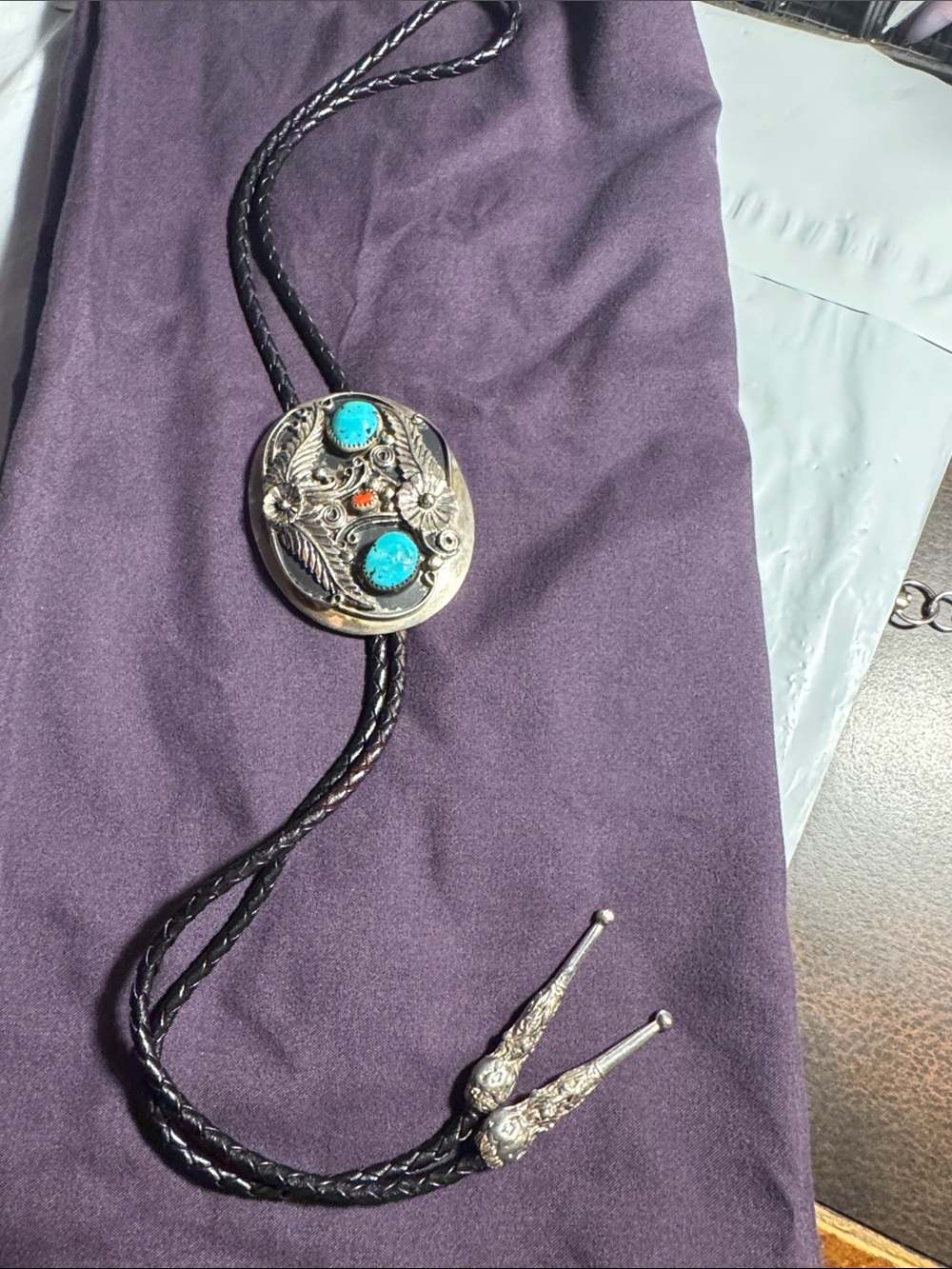 Turquoise Stone Western Bolo Tie - Silver Like Floral Accent